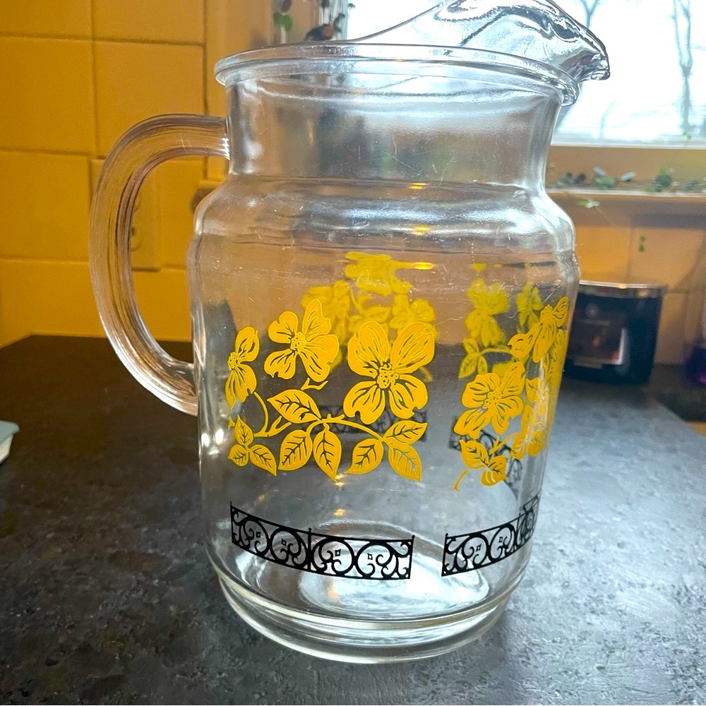 Vintage glass, water pitcher with ice lip. Yellow and black pattern.